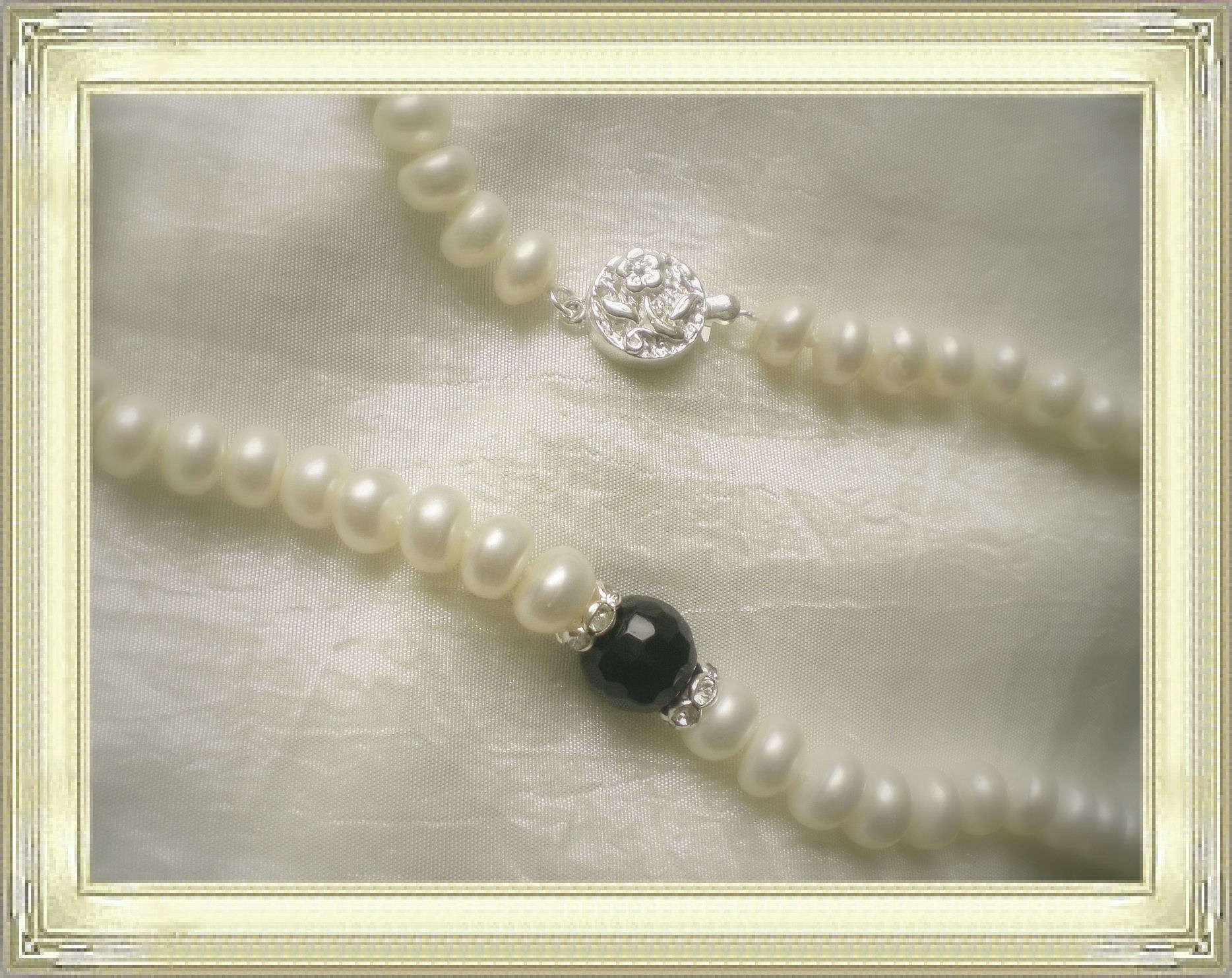 Freshwater pearl necklace with ONYX crystal and zircon inserts with sterling silver push in clasp